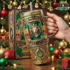 Hand holding a reggae inspired metal tumbler with lion emblem and colorful design surrounded by holiday decorations!