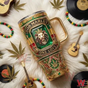 Metal tumbler with lion emblem and reggae themed design placed on a soft surface with musical accessories and leaf decorations!