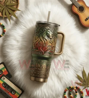 Lion themed insulated tumbler resting on a white surface with music tapes beads and instruments around!