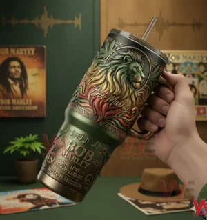 Hand holding a green lion themed insulated tumbler with handle in a music inspired room!