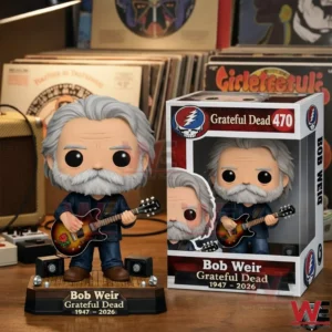 Vinyl guitar player figure with grey hair and beard on a platform next to a Grateful Dead 470 box with records and audio equipment in the background!