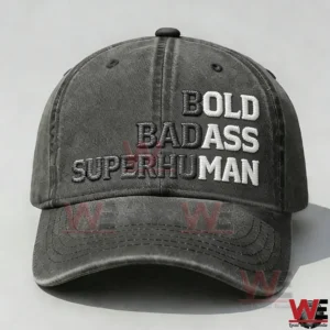 Front view of a dark gray baseball cap with bold embroidered words in black and white thread on the crown!