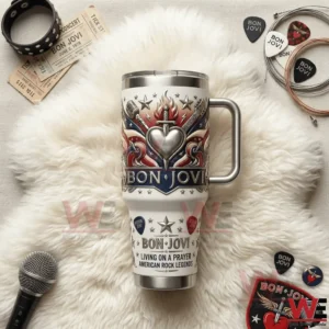 Rock music insulated tumbler with handle placed on soft fabric with music props!