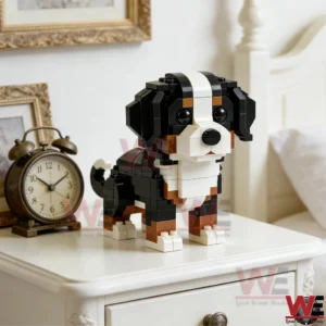 A brick constructed Bernese Mountain Dog figure displayed on a white bedside table next to a vintage clock and decorative frames!