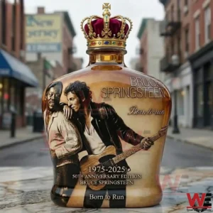 Alt text Crowned Bruce Springsteen Born to Run 1975 2025 anniversary whiskey bottle standing on a city street background!
