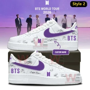 White Nike Air Force one sneaker with purple swoosh BTS text signature style graphics and custom name shown on a shoebox with BTS world tour 2026 background