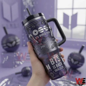 Hand holding a purple BTS World Tour insulated tumbler with handle straw and BTS Is Back 2026.03.20 design!