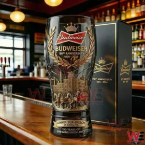 Budweiser anniversary pilsner glass on a bar counter!