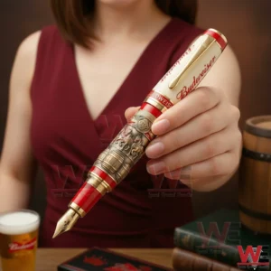 Woman holding a beer brand inspired luxury fountain pen in a warm indoor environment!