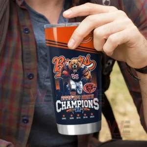 Hand holding a navy and orange Chicago Bears 2025 NFC North Champions tumbler with bear football player illustration and championship text!