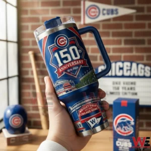Chicago Cubs 150th Anniversary Tumbler 3 Hand holding a Chicago Cubs 150th anniversary tumbler with team themed decor and matching box in the background!