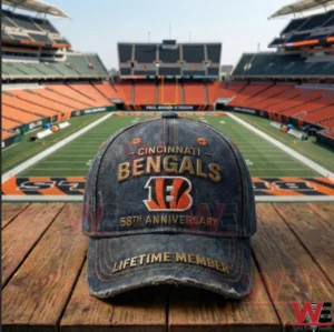 Cincinnati Bengals 58th anniversary baseball cap positioned in front of a football field inside a large stadium!