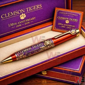 Clemson Tigers one hundred thirtieth anniversary ballpoint pen in a presentation box featuring orange gold and purple colors with tiger head artwork and anniversary text.