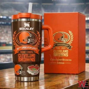 Brown Cleveland Browns anniversary insulated travel mug with orange lid handle and straw beside an orange gift box with a blurred stadium background!