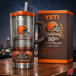 Cleveland Browns 80Th Anniversary 2026 Limited Edition 1946-2026 Yeti Tumbler 5 Silver Yeti tumbler with orange lid and Cleveland Browns 80th anniversary design beside a matching box with a night skyline background!