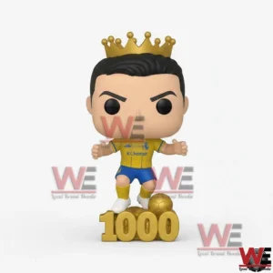 Cristiano Ronaldo Al Nassr 1000 Goals Pop Figure 4 A crowned football collectible figure in a celebratory stance positioned on a gold milestone base against a clean background!
