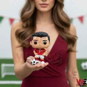Cristiano Ronaldo CR7 Portugal Pop Figure 5 Woman holding a small red football player vinyl figure with a soccer ball in her hand!