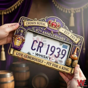 Crown Royal Live Generously Fit for a King 87th Anniversary Car License Plate Frame 3 Hands holding a purple and gold Crown Royal anniversary license plate frame with crown emblem whisky bottle and the slogan live generously fit for a king!