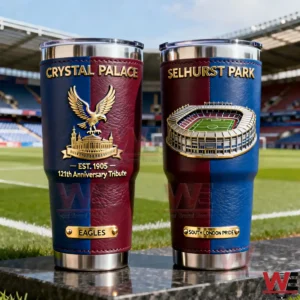 Two Crystal Palace insulated tumblers with red and blue textured exterior gold lettering eagle crest anniversary tribute and a detailed Selhurst Park stadium design displayed on the football field!