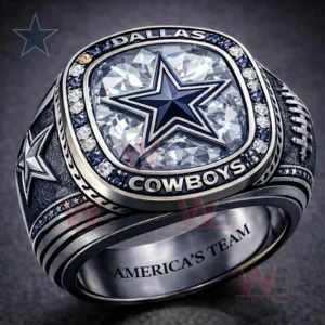Silver Dallas Cowboys ring with a large clear gemstone face raised blue star logo blue and white stone border Dallas Cowboys text on the rim and America s Team engraving inside!