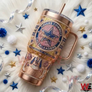 Rose gold Dallas Cowboys Cheerleaders tumbler displayed on white fur with star shaped decorative elements!