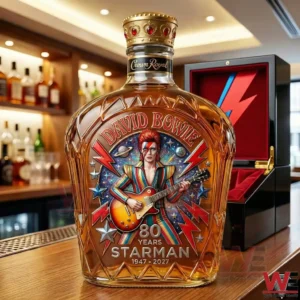 A David Bowie Starman anniversary whiskey bottle with ornate glass design colorful musician artwork lightning symbols and a premium bar setting in the background!