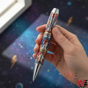 Hand holding a luxury David Bowie Starman themed collectible pen with colorful detailed design and metallic finish!