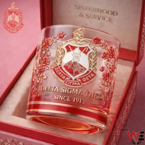 Delta Sigma Theta whiskey glass placed inside a red presentation box with floral accents and a classic sorority crest!