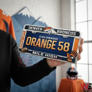 Denver Broncos Mile High Car License Plate Frame 3 Person holding a Denver Broncos Colorado license plate with Orange 58 Mile High text and team logo in a room with sports themed background!