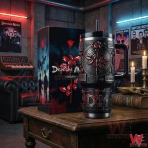 Black handled tumbler with red rose and vinyl record style emblem beside a matching gift box on a wooden table in a dark music studio room!