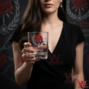 A woman holding a Depeche Mode themed whiskey glass with a red rose design!