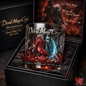 Devil May Cry anniversary collector whiskey glass placed inside a black presentation box with detailed artwork and rich cinematic lighting!