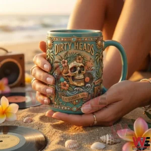 Dirty Heads California Soul mug held by hands on a sandy beach!