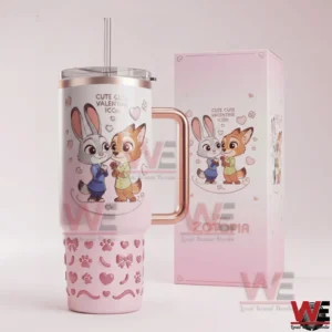 Pink insulated tumbler with cute animal design and handle placed next to a matching gift box on a clean background!