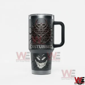 Front view of a Disturbed themed insulated tumbler with handle dark metallic artwork raised emblem and cracked smiling face graphic on a white background!