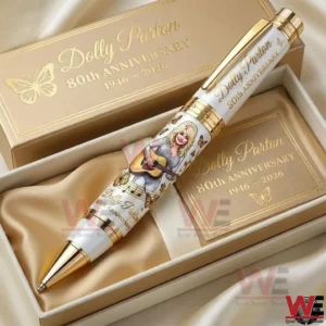 Close up of a Dolly Parton commemorative pen with detailed artwork resting inside a high end gift box!