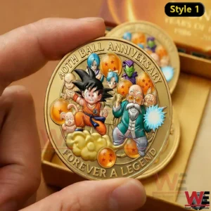A hand holding a Dragon Ball fortieth anniversary commemorative coin featuring classic characters golden clouds and detailed embossed artwork!
