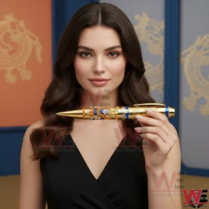 Woman holding a golden Dragon Ball anniversary pen!