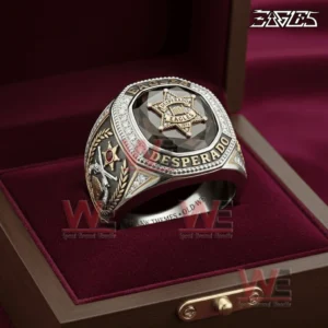 Eagles Desperado statement ring with a black gemstone centerpiece displayed inside a velvet jewelry box featuring sparkling accents and bold engraved western themed details!