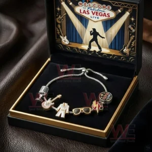 Gift boxed adjustable charm bracelet with music themed charms and Las Vegas live artwork inside a black and gold presentation box.