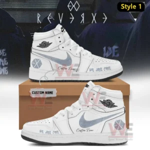 Two white high top sneakers with silver swoosh EXO logo graphics We Are One text and custom name detail displayed on a shoebox with Reverxe themed background!