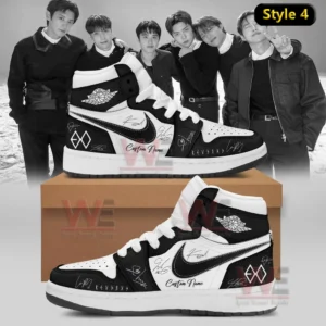 Two black and white high top sneakers with black swoosh EXO logos signature accents and custom name text shown on a shoebox with a black and white group photo backdrop!