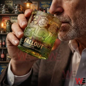 A close up view of a man holding and drinking from a Fallout themed whiskey glass in a richly decorated Fallout inspired setting!