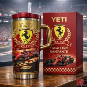 Gold and red racing themed tumbler with handle and straw beside a matching gift box on a wooden table in a stadium background!