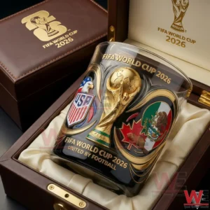 A FIFA World Cup commemorative whiskey glass resting inside a premium gift box with iconic trophy artwork and polished details!