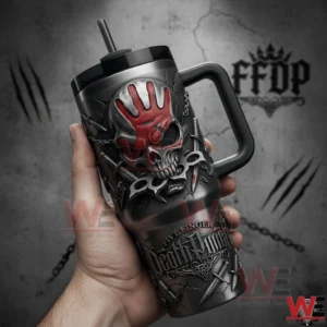 Hand holding a Five Finger Death Punch insulated tumbler with handle straw skull design red handprint and cracked metallic artwork with a gritty industrial blurred background!