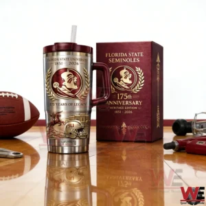 Florida State Seminoles 175th Anniversary Heritage Edition YETI Tumbler 4 Florida State Seminoles insulated tumbler with maroon handle and straw next to a matching 175th anniversary gift box on a wooden table with a football nearby.