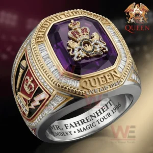 Close up of a gold and silver ring with a large purple gemstone and Queen crest surrounded by diamond accents.