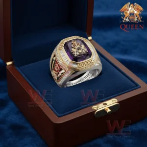 Ring placed inside an open wooden presentation box with blue velvet lining and a purple gemstone centerpiece.