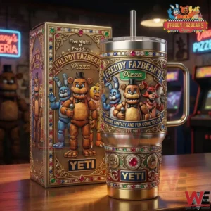 Freddy Fazbears Pizza themed Yeti tumbler with character artwork displayed on a table in an arcade environment!